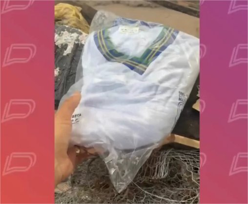 Uniformes escolares são encontrados no lixo em Cuiabá; veja vídeo